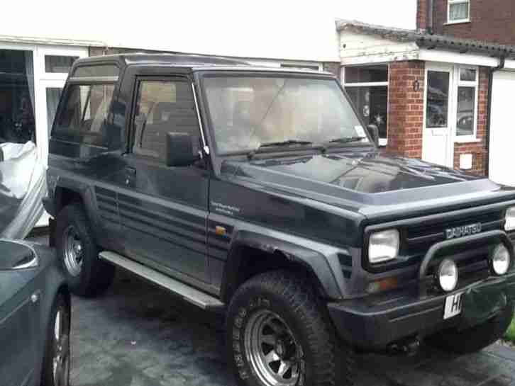 1990 FOURTRAK BLACK SILVER