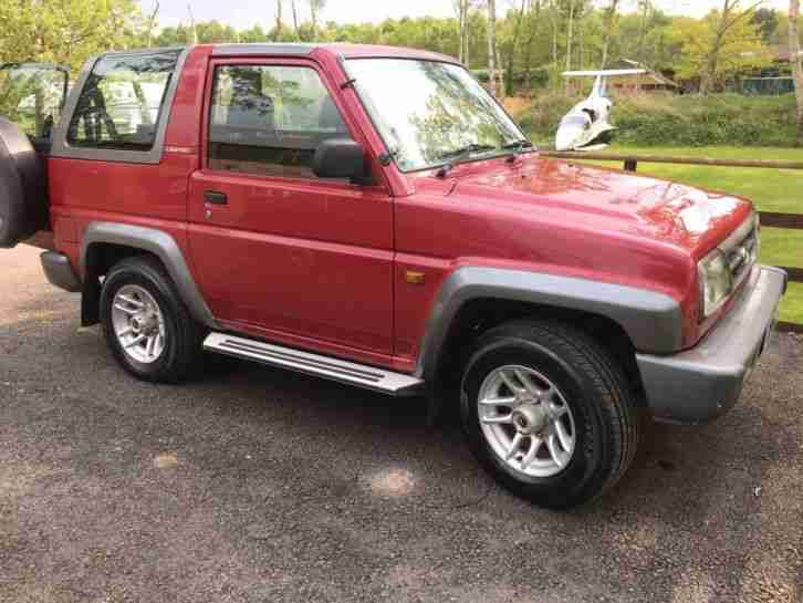 1996 DAIHATSU SPORTRAK ANJOU RED NO RESERVE, LONG MOT