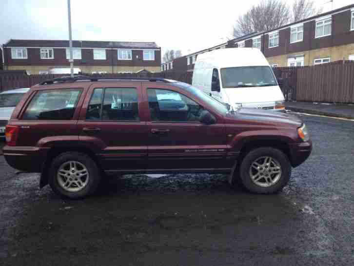 1999 GRAND CHEROKEE LIMITED RED LPG