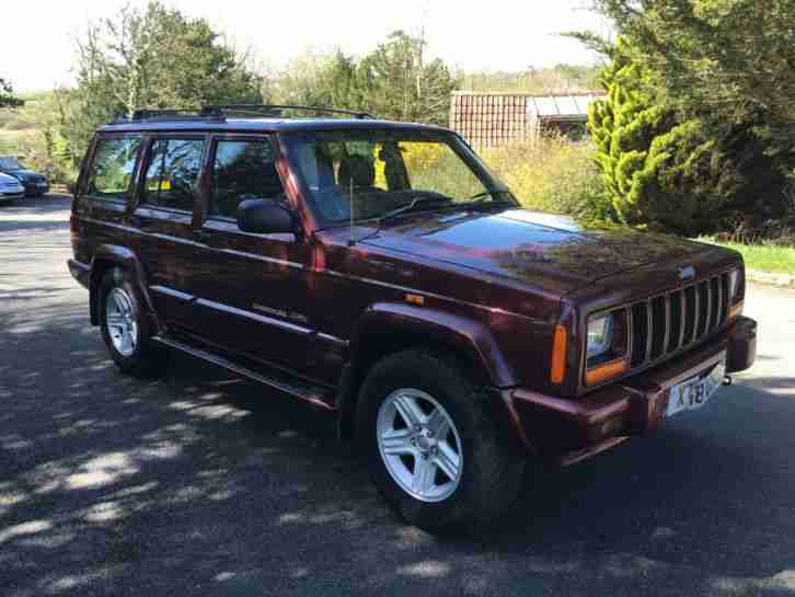 2001 JEEP CHEROKEE CLASSIC AUTO RED 4.0 MEGA LOW MILEAGE.....
