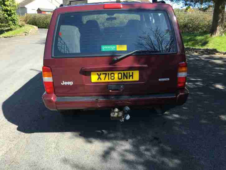 2001 JEEP CHEROKEE CLASSIC AUTO RED 4.0 MEGA LOW MILEAGE.....