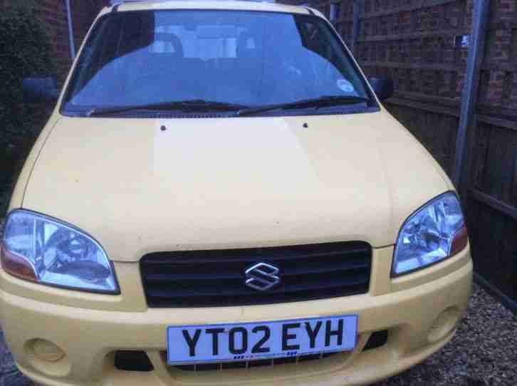 2002 SUZUKI IGNIS GA YELLOW