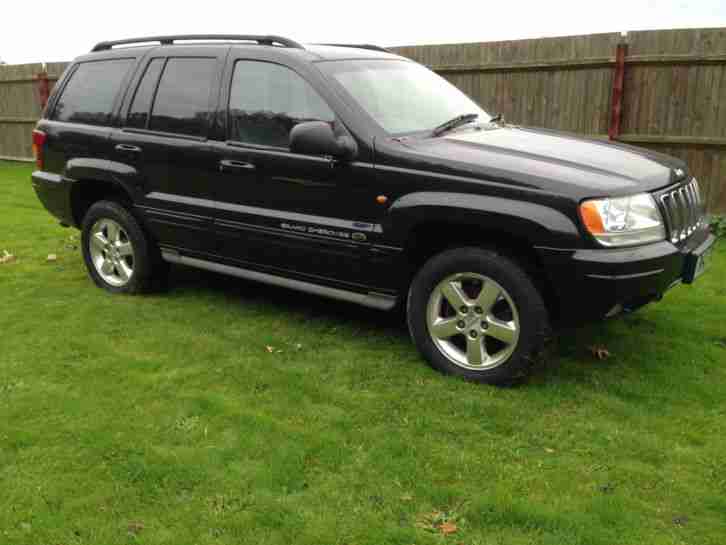 2003 GR CHEROKEE CRD OV LAND A BLACK