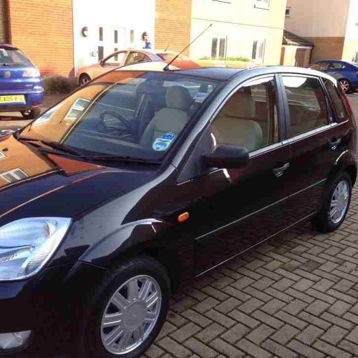 2004 FIESTA GHIA SEMI AUTO BLACK