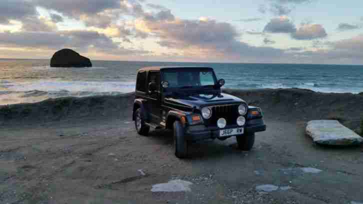 2004 WRANGLER SAHARA AUTO BLACK