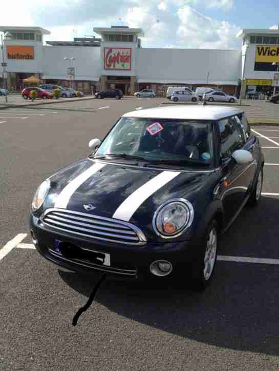 2006 Mini Cooper. Astro Black with White Roof.