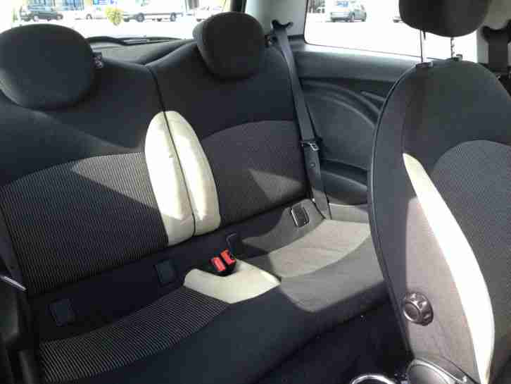 2006 Mini Cooper. Astro Black with White Roof.