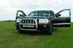 2007 G CHEROKEE OVERLAND CRD A BLACK