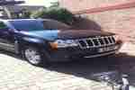 2009 G CHEROKEE OVERLAND CRD A BLACK