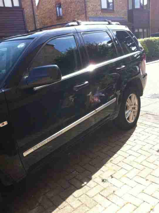 2009 JEEP G-CHEROKEE OVERLAND CRD A BLACK