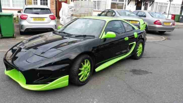 BLACK GREEN TOYOTA MR2 JAPANESE IMPORT SPORTS CAR WITH BODY KIT MONSTER ENERGY