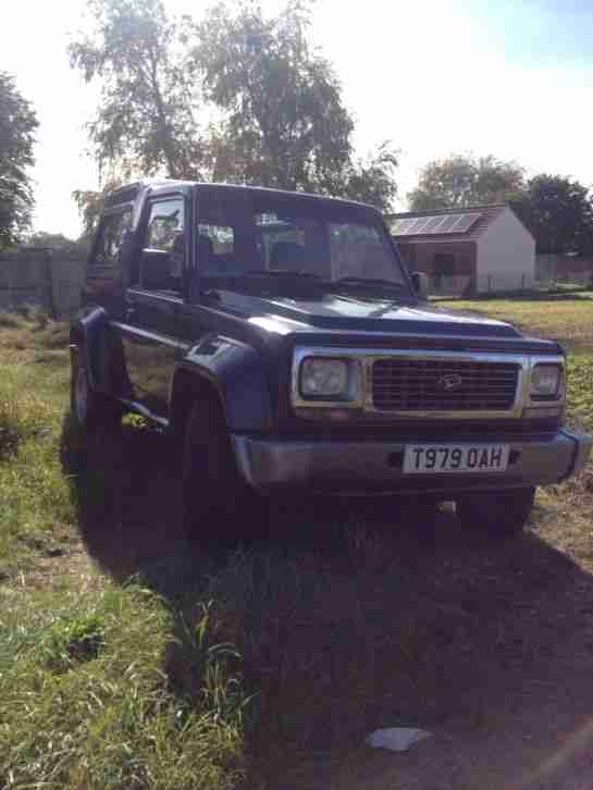 DIAHATSU FOURTRACK TDX. Daihatsu car from United Kingdom