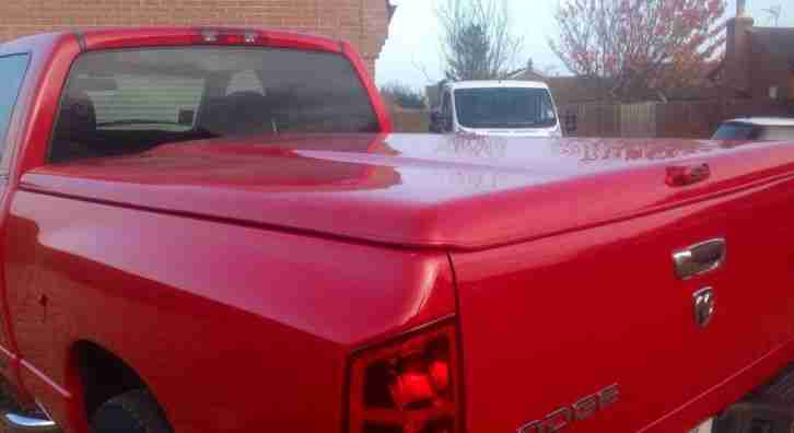 Dodge RAM pick up truck solid load bed cover