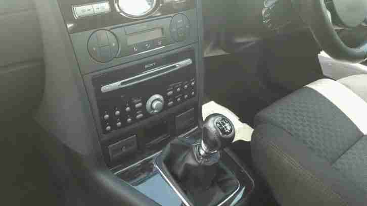 Ford mondeo ghia tdci 2006. Excellent example.