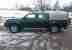 Green Nissan Navara 2004