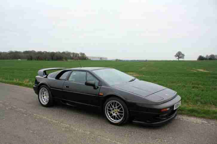 Lotus Esprit Twin Turbo V8, 2000. Metallic black + black leather trim.