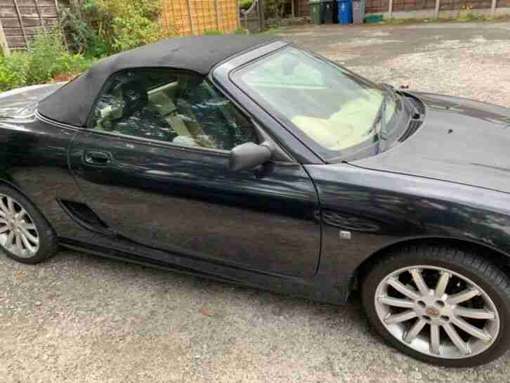 Metallic Black TF Convertible Tan Interior