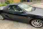 Metallic Black TF Convertible Tan Interior