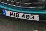 Personal plate Reg Men in Black 2002 Merc