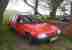 Peugeot 205, red, diesel. 111000 miles. Spares or repairs.
