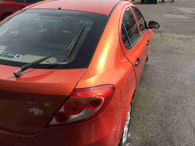 Proton GEN-2 1.6 GLS Petrol Hatchback in Metallic Burnt Orange