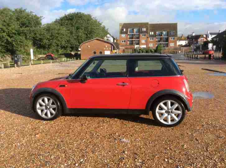 Red Mini Cooper 2002 52 plate