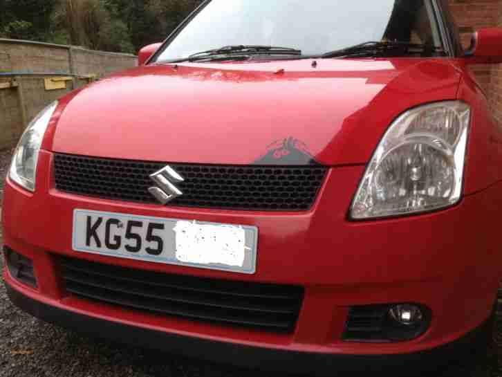 Red Suzuki Swift Diesel 1.3