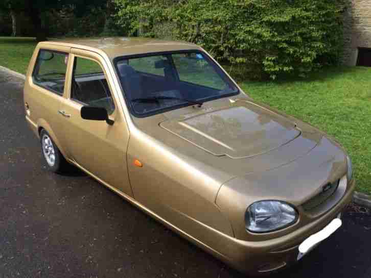 Reliant Robin 65 gold 2001 model. car for sale