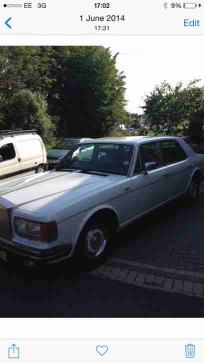 Rolls Royce silver spirit, ideal white wedding car.