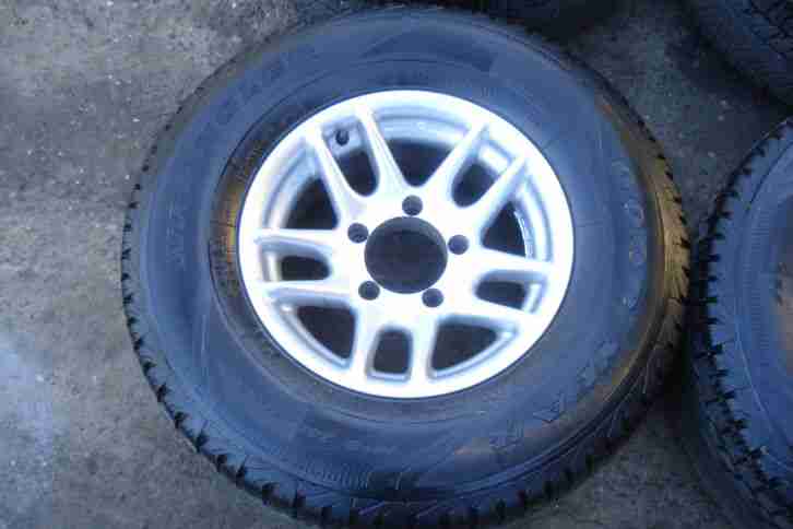 SET OF 4 DAIHATSU FOURTRAK 2.8 ALLOY WHEELS AND TYRES 255 x 75 x 15 (265)