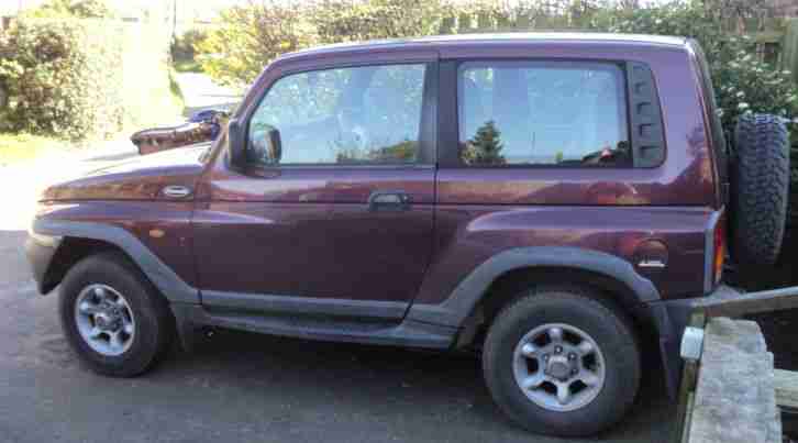 KORANDO 4X4 (R REG), MAROON COLOUR.