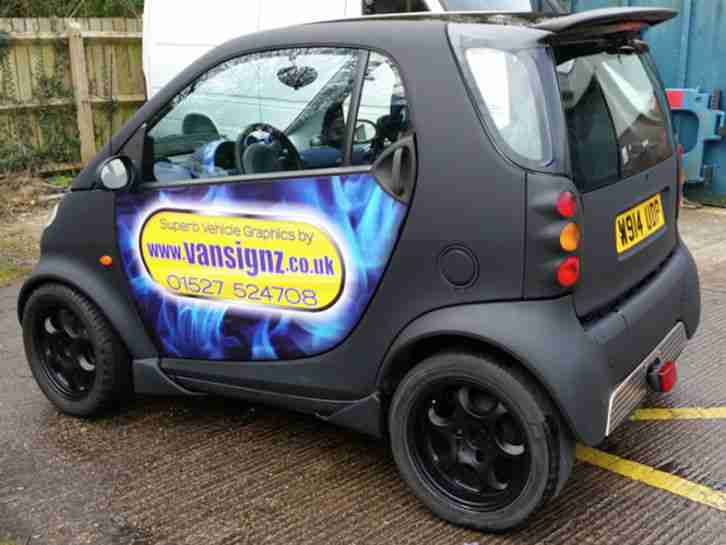 STEALTH SMART! ORIGINALLY SILVER; WRAPPED IN MATT BLACK & CARBON.