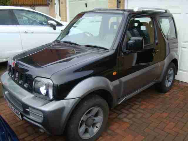 SUZUKI JIMNY JLX VVT BLACK AND PEARL WITH HALF LEATHER