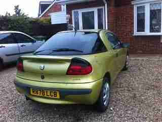 Vauxhall Tigra coupe metallic yellow 1.4i 16v 3dr 110k 1997 plate