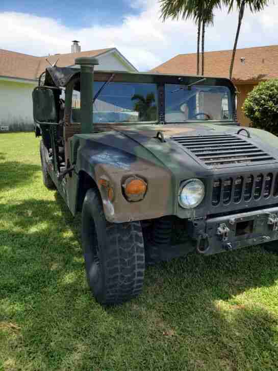 Hummer H1 (AM General 4 door soft top w/truck body)